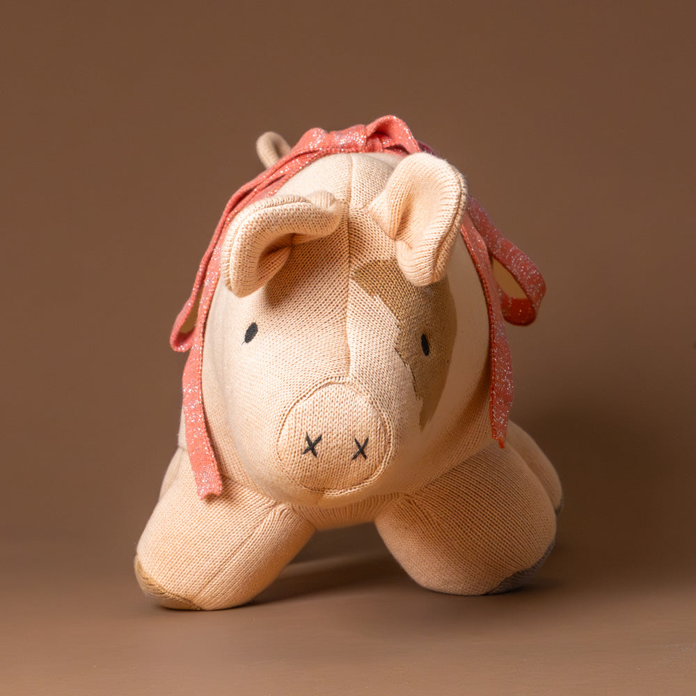 sofie-pig-stuffed-animal-with-coral-bow