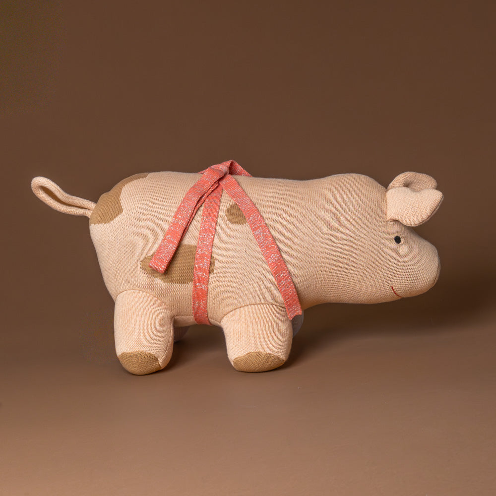 sofie-pig-stuffed-animal-with-coral-bow-side