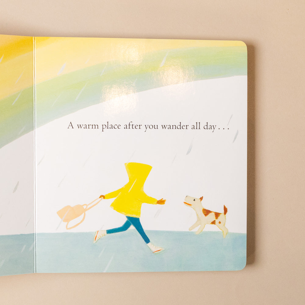 this-is-a-gift-for-you-board-book-a-celebration-of-love Illustration of a person in a yellow raincoat with a dog, set against a rainy  landscape with text.