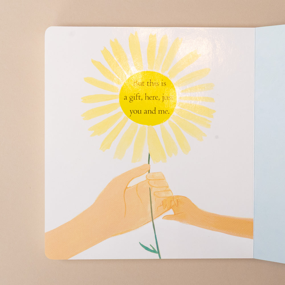 this-is-a-gift-for-you-board-book-a-celebration-of-love-open-page-with-illustration-of-flower-between-two-hands-and-text
