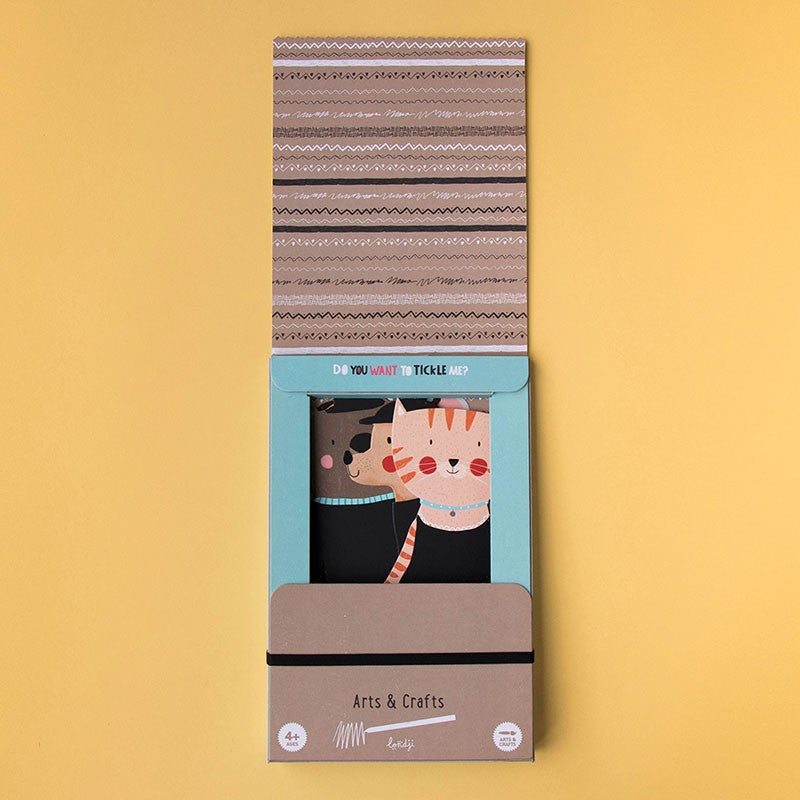 tickle-me-arts-and-crafts-kitPackaged product with cartoon characters on a yellow background