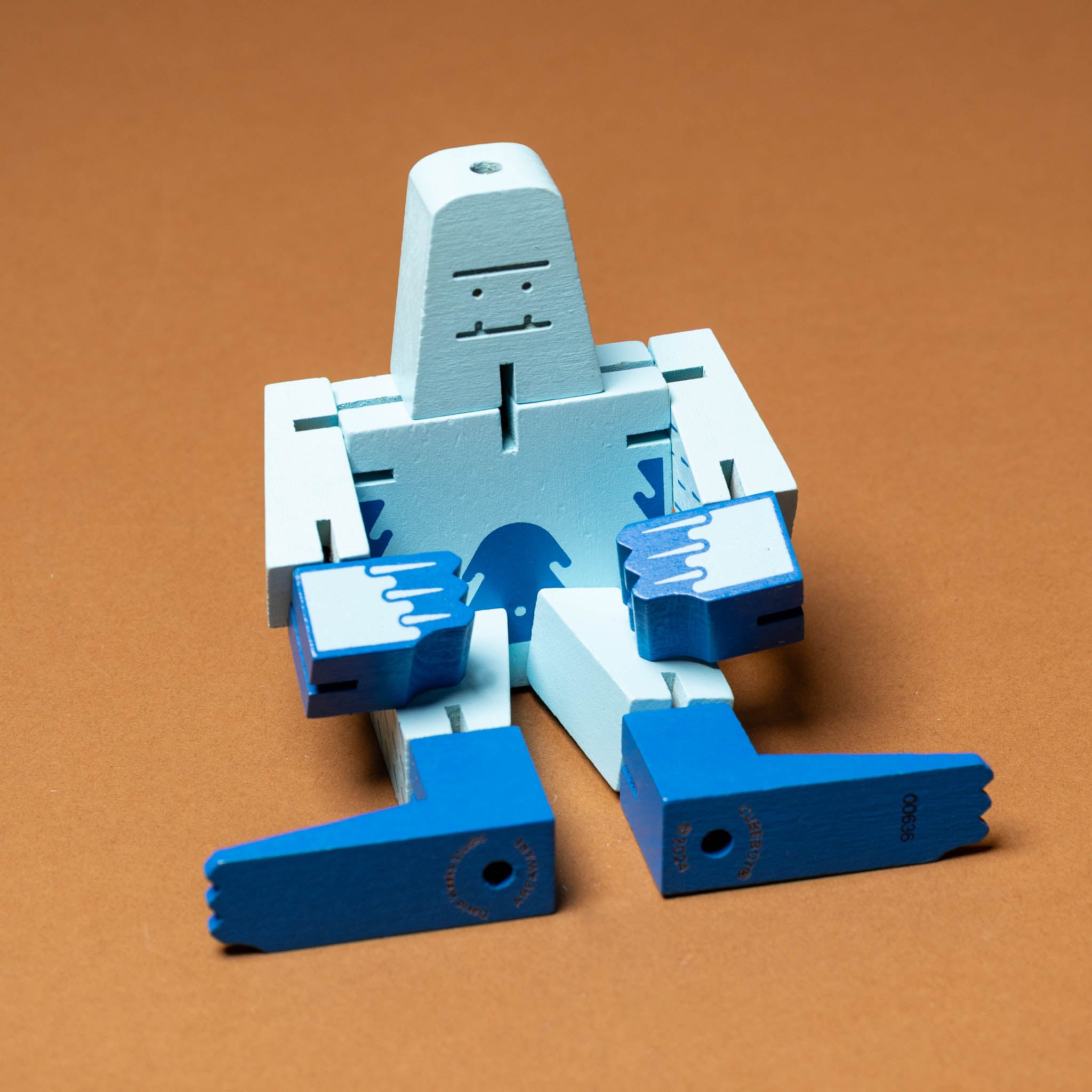 wooden-cubebot-blue-yeti-sitting