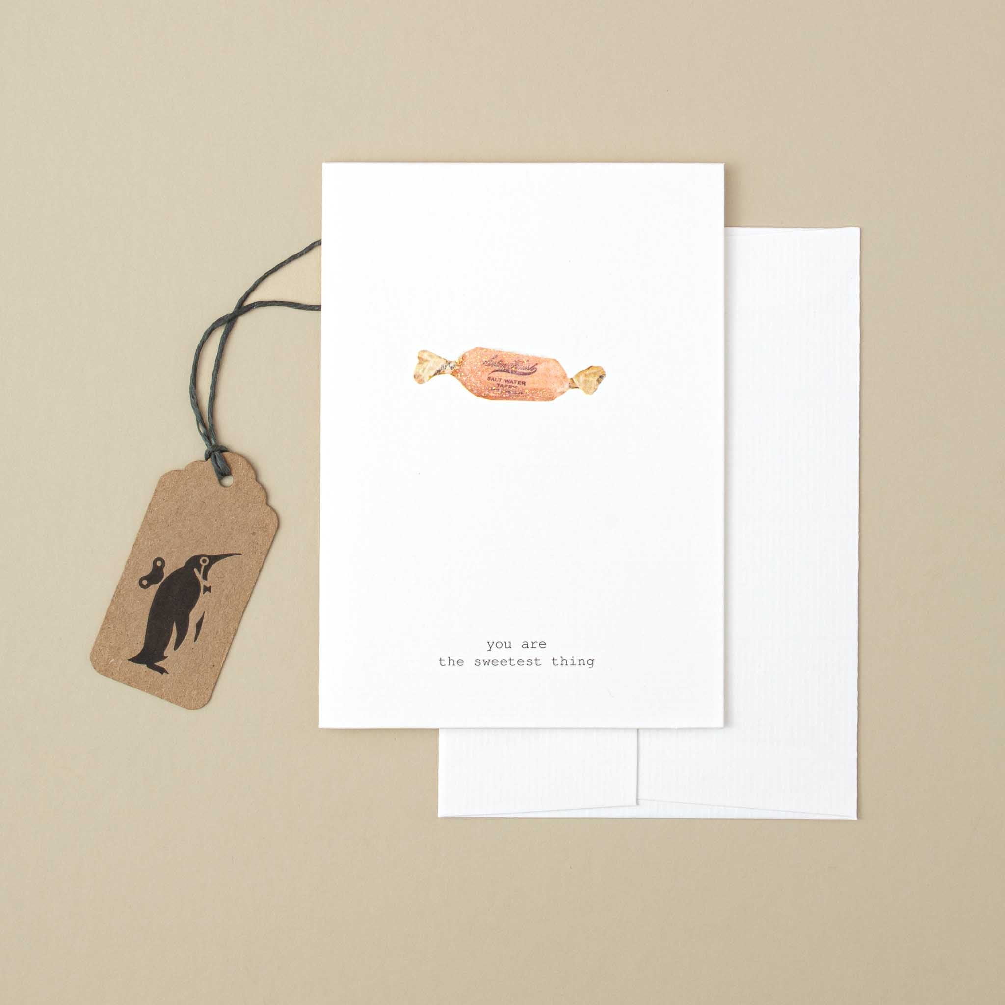 white-greeting-card-wrapped-candy-illustration-with-black-text-reading-you-are-the-sweetest-thing